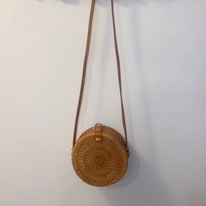 Ratan crossbody bag with brown leather strap